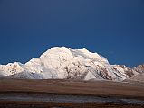 04 Gang Benchen From Shishapangma North Base Camp Just Before Sunrise The large mountain to the north west of Shishapangma is Gang Benchen with heights variously given as 7281m, 7295m or 7299m, taken from Shishapangma North Chinese Base Camp (5029m) just before sunrise.